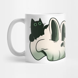 Cat on the skull Mug